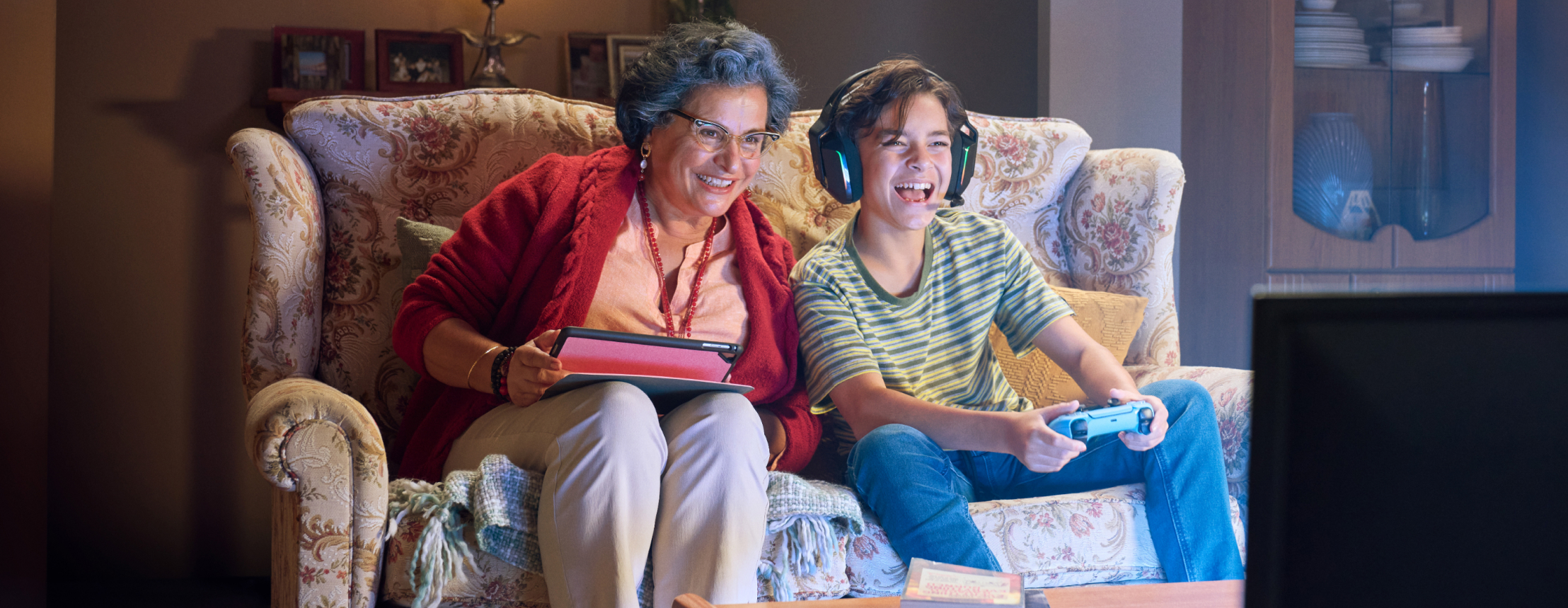 older lady and boy on couch