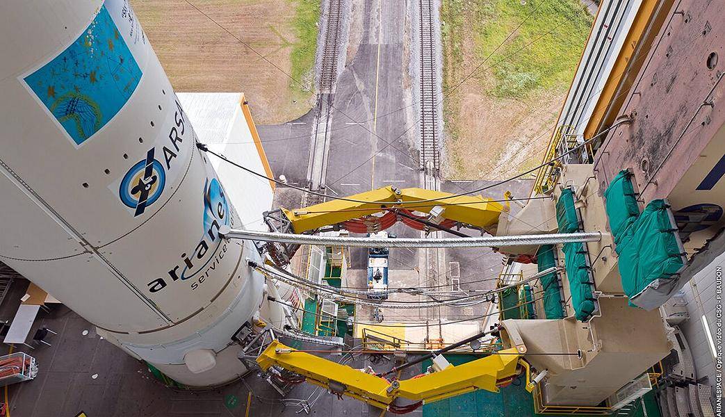 A view from above looking down on a rocket on the launchpad before lift off